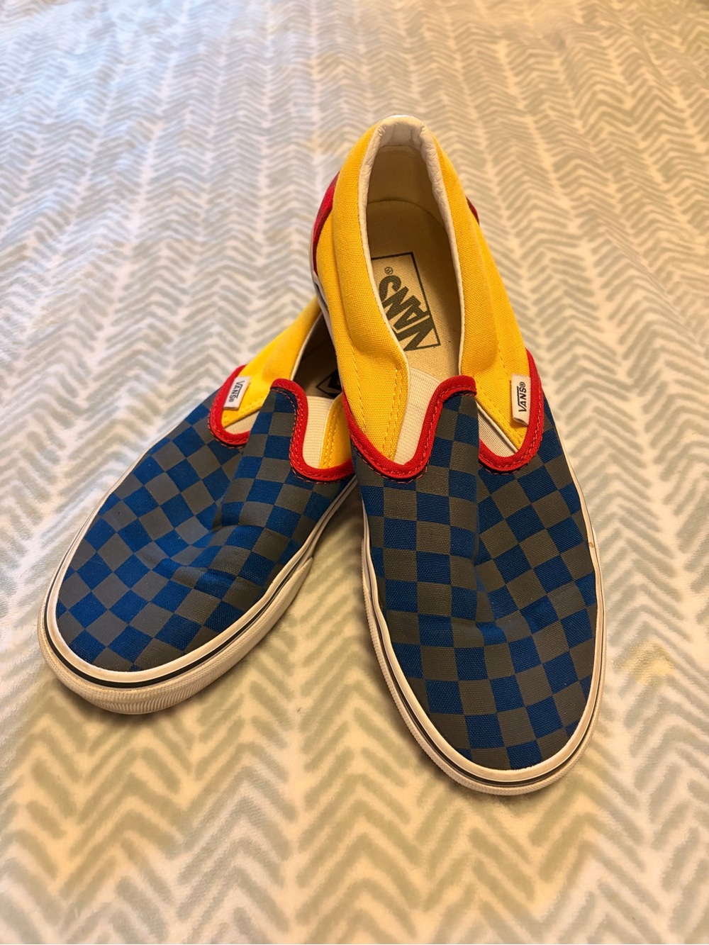 Vans Slip-On Checkerboard Sneakers in Blue/Yellow/Red